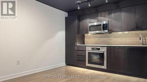 922 - 10 Capreol Court, Toronto, ON - Indoor Photo Showing Kitchen