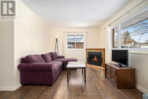 18 Mclean Boulevard, Perth, ON - Indoor Photo Showing Living Room With Fireplace