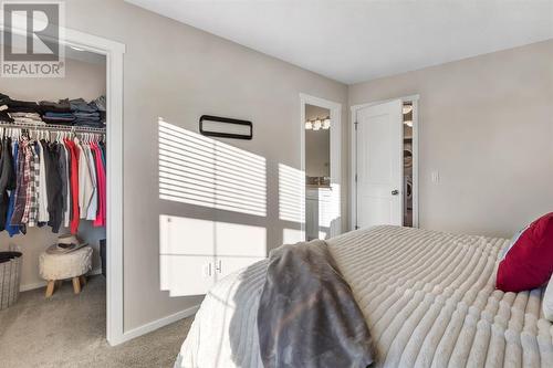 100 Legacy Main Street Se, Calgary, AB - Indoor Photo Showing Bedroom