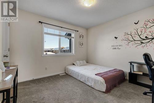 100 Legacy Main Street Se, Calgary, AB - Indoor Photo Showing Bedroom