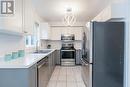 18 Bentley Crescent, Barrie, ON  - Indoor Photo Showing Kitchen With Stainless Steel Kitchen With Double Sink 