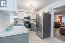 18 Bentley Crescent, Barrie, ON  - Indoor Photo Showing Kitchen With Stainless Steel Kitchen With Double Sink 