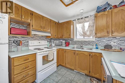 17 Blais Street, Russell, ON - Indoor Photo Showing Kitchen With Double Sink