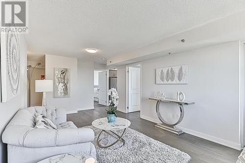 1511 - 185 Bonis Avenue, Toronto, ON - Indoor Photo Showing Living Room