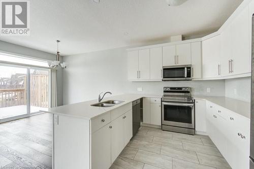 745 Chelton Road Unit# 62, London, ON - Indoor Photo Showing Kitchen With Double Sink