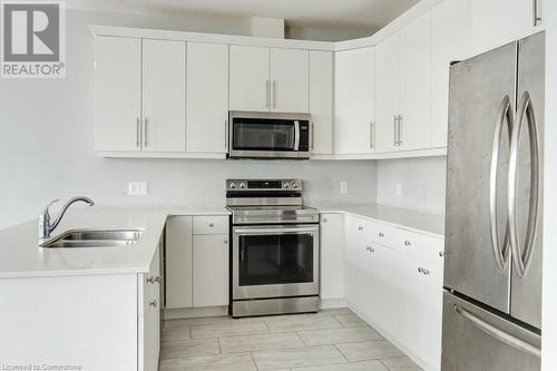 745 Chelton Road Unit# 62, London, ON - Indoor Photo Showing Kitchen With Double Sink