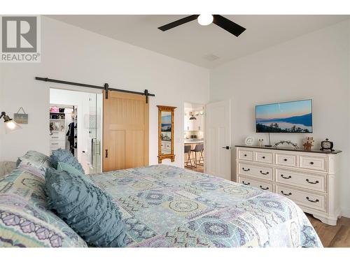 Carriage House - Primary Bedroom (Main Level) - 10833 Hare Road, Lake Country, BC - Indoor Photo Showing Bedroom