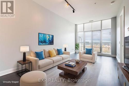 724 - 2480 Prince Michael Drive, Oakville, ON - Indoor Photo Showing Living Room