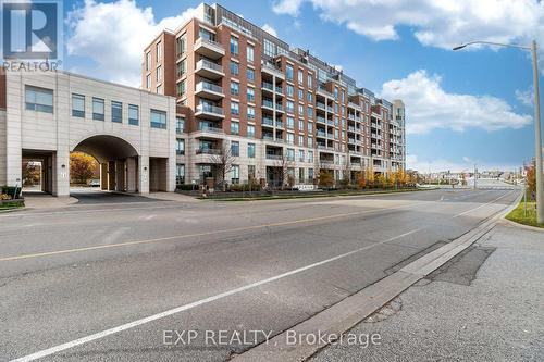 724 - 2480 Prince Michael Drive, Oakville, ON - Outdoor With Balcony With Facade