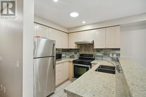 27 - 5055 Heatherleigh Avenue, Mississauga, ON - Indoor Photo Showing Kitchen With Double Sink