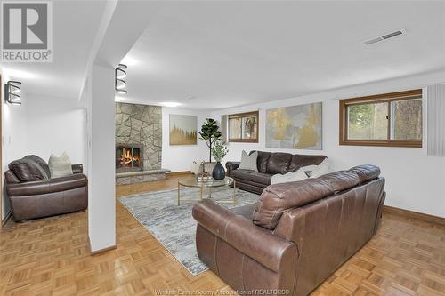 6845 Disputed Road, Lasalle, ON - Indoor Photo Showing Living Room With Fireplace