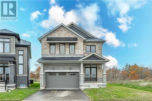 Craftsman-style home with a front lawn and a garage - 116 Whithorn Crescent, Caledonia, ON - Outdoor With Facade