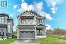 Craftsman-style home with a front lawn and a garage - 116 Whithorn Crescent, Caledonia, ON  - Outdoor With Facade 