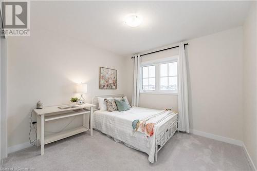 View of carpeted bedroom - 116 Whithorn Crescent, Caledonia, ON - Indoor Photo Showing Bedroom