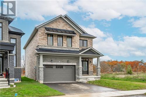 Craftsman house with a garage and a front lawn - 116 Whithorn Crescent, Caledonia, ON - Outdoor With Facade