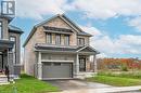 Craftsman house with a garage and a front lawn - 116 Whithorn Crescent, Caledonia, ON  - Outdoor With Facade 