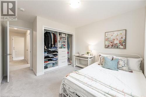 Carpeted bedroom featuring a closet - 116 Whithorn Crescent, Caledonia, ON - Indoor Photo Showing Bedroom