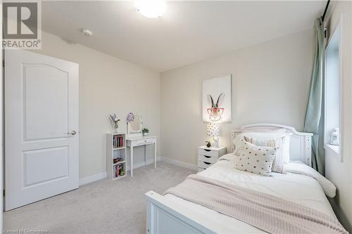 View of carpeted bedroom - 116 Whithorn Crescent, Caledonia, ON - Indoor Photo Showing Bedroom