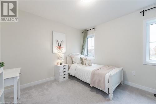 Bedroom featuring light carpet - 116 Whithorn Crescent, Caledonia, ON - Indoor Photo Showing Bedroom