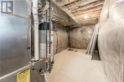 Basement featuring gas water heater - 116 Whithorn Crescent, Caledonia, ON - Indoor Photo Showing Basement