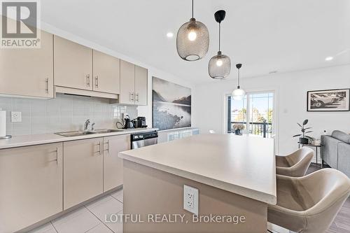 8 - 365 Tribeca Lane, Ottawa, ON - Indoor Photo Showing Kitchen With Double Sink