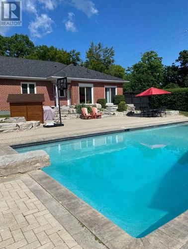 68 Dundonald Street, Barrie, ON - Outdoor With In Ground Pool With Deck Patio Veranda