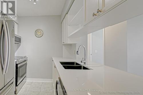 405 - 2365 Central Park Drive, Oakville, ON - Indoor Photo Showing Kitchen With Double Sink