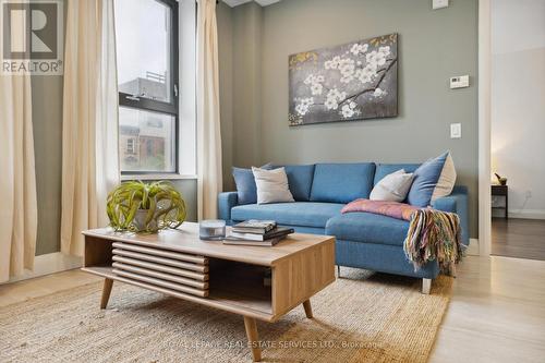 313 - 118 King Street E, Hamilton, ON - Indoor Photo Showing Living Room