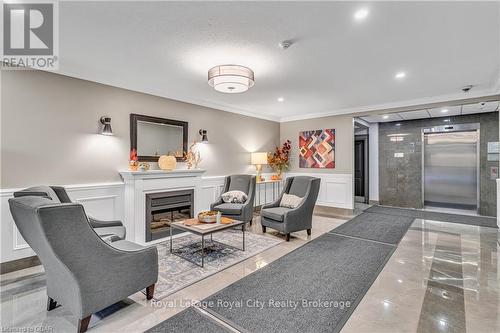 311 - 60 Wyndham Street S, Guelph (Two Rivers), ON - Indoor With Fireplace