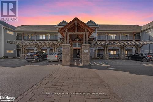 201 - 4 Brandy Lane Drive, Collingwood, ON - Outdoor With Balcony With Facade