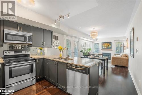 201 - 4 Brandy Lane Drive, Collingwood, ON - Indoor Photo Showing Kitchen With Stainless Steel Kitchen With Double Sink