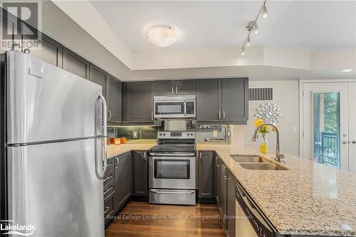 201 - 4 Brandy Lane Drive, Collingwood, ON - Indoor Photo Showing Kitchen With Stainless Steel Kitchen With Double Sink With Upgraded Kitchen