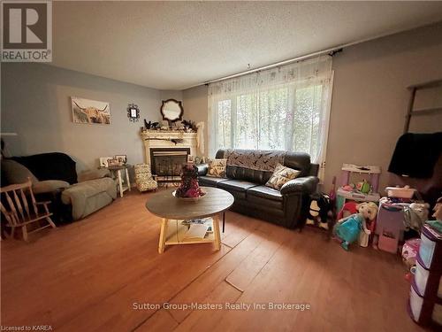 13 Coventry Crescent, Kingston (West Of Sir John A. Blvd), ON - Indoor Photo Showing Living Room With Fireplace