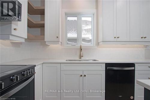 7 Nelson Street, West Perth (Mitchell), ON - Indoor Photo Showing Kitchen With Double Sink