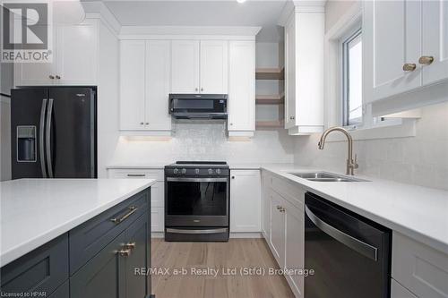 7 Nelson Street, West Perth (Mitchell), ON - Indoor Photo Showing Kitchen With Double Sink