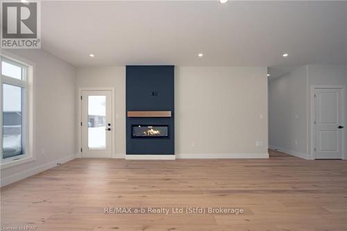 7 Nelson Street, West Perth (Mitchell), ON - Indoor With Fireplace