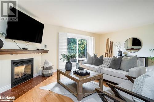 3 - 63 Bay Street W, Blue Mountains (Thornbury), ON - Indoor Photo Showing Living Room With Fireplace