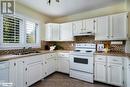 3 - 63 Bay Street W, Blue Mountains (Thornbury), ON  - Indoor Photo Showing Kitchen With Double Sink 