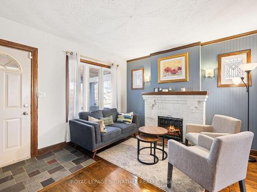 99 Mclaughlin Blvd, Oshawa, ON - Indoor Photo Showing Living Room With Fireplace