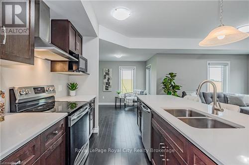 58 - 107 Westra Drive, Guelph/Eramosa, ON - Indoor Photo Showing Kitchen With Double Sink With Upgraded Kitchen