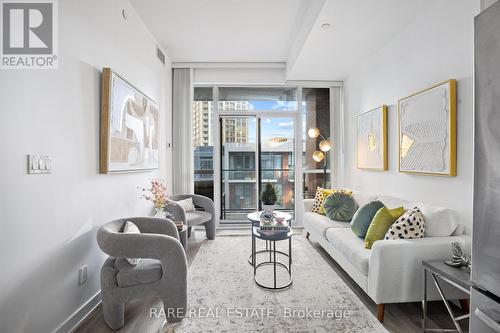 718 - 50 Bruyeres Mews, Toronto, ON - Indoor Photo Showing Living Room