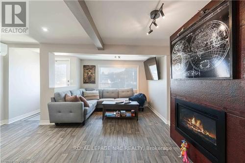 10 Thorold Road E, Welland (767 - N. Welland), ON - Indoor Photo Showing Living Room With Fireplace