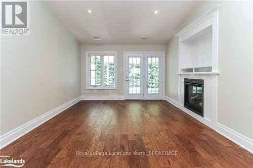 48 Clover Crescent, Wasaga Beach, ON - Indoor Photo Showing Other Room With Fireplace