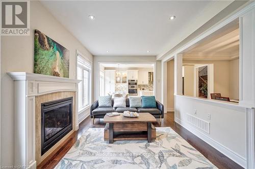 211 Sixteen Mile Drive, Oakville (1008 - Go Glenorchy), ON - Indoor Photo Showing Living Room With Fireplace