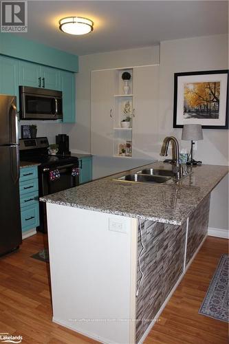 107 - 3 Brandy Lane Drive, Collingwood, ON - Indoor Photo Showing Kitchen With Double Sink