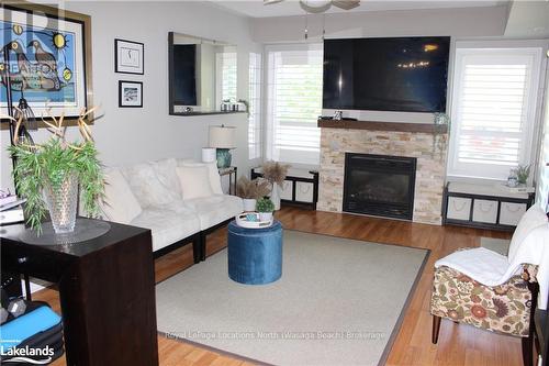 107 - 3 Brandy Lane Drive, Collingwood, ON - Indoor Photo Showing Living Room With Fireplace