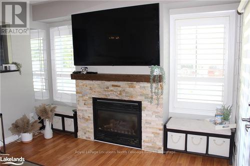 107 - 3 Brandy Lane Drive, Collingwood, ON - Indoor Photo Showing Living Room With Fireplace