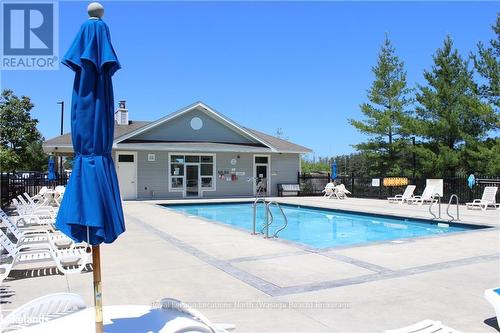 107 - 3 Brandy Lane Drive, Collingwood, ON - Outdoor With In Ground Pool