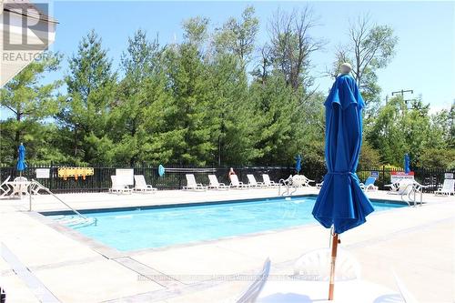 107 - 3 Brandy Lane Drive, Collingwood, ON - Outdoor With In Ground Pool