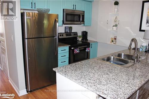 107 - 3 Brandy Lane Drive, Collingwood, ON - Indoor Photo Showing Kitchen With Double Sink With Upgraded Kitchen